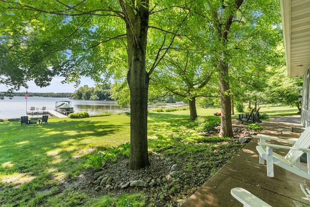 20592 Lehmicke Ln, Trade Lake, WI 54853 - view of green lawn with a water view and a dock
