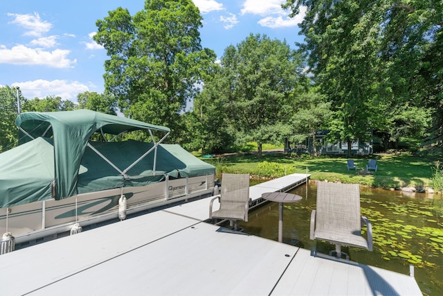 20592 Lehmicke Ln, Trade Lake, WI 54853 - dock area with view of wooded area and a yard