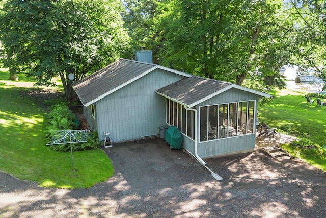 20592 Lehmicke Ln, Trade Lake, WI 54853 - view of outdoor structure with a sunroom