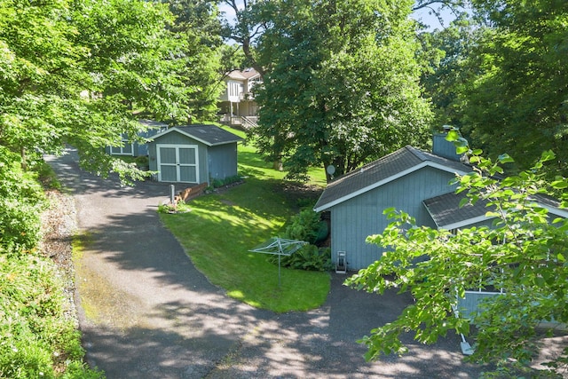 20592 Lehmicke Ln, Trade Lake, WI 54853 - view of grassy yard featuring a shed