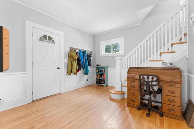 218 11th Ave NE, Rochester, MN 55906 - foyer entrance featuring wood-type flooring, stairway, and a wainscoted wall