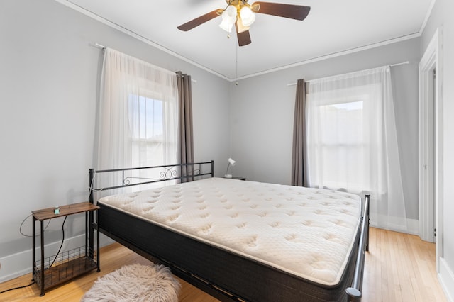 218 11th Ave NE, Rochester, MN 55906 - bedroom featuring crown molding, light wood-type flooring, and ceiling fan