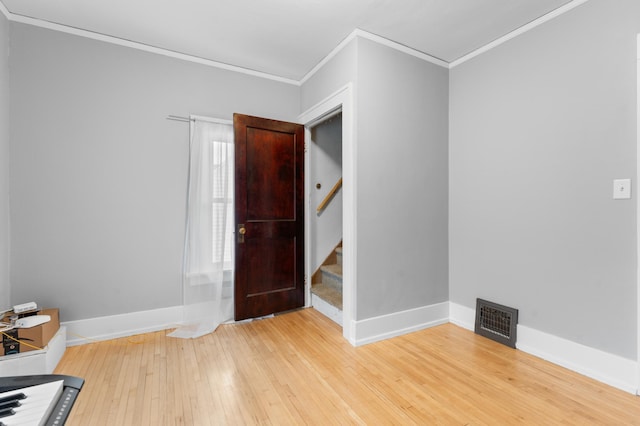 218 11th Ave NE, Rochester, MN 55906 - foyer entrance with ornamental molding, hardwood / wood-style flooring, and stairs
