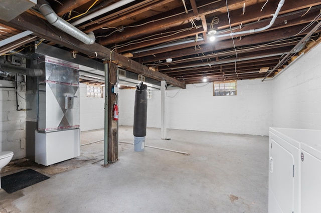 218 11th Ave NE, Rochester, MN 55906 - basement with washer and clothes dryer and heating unit