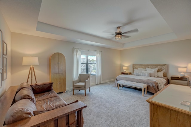 21 Windsor Wood Path, Hudson, WI 54016 - bedroom featuring a raised ceiling, light carpet, and ceiling fan