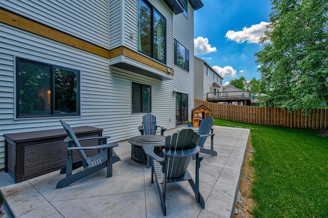 21 Windsor Wood Path, Hudson, WI 54016 - view of patio / terrace with a fire pit