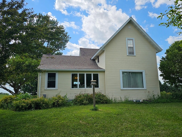 86389 245th St, Albert Lea, MN 56007 - rear view of property featuring a yard