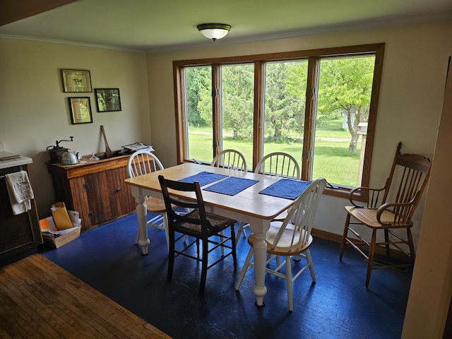 86389 245th St, Albert Lea, MN 56007 - dining space featuring ornamental molding and wood finished floors
