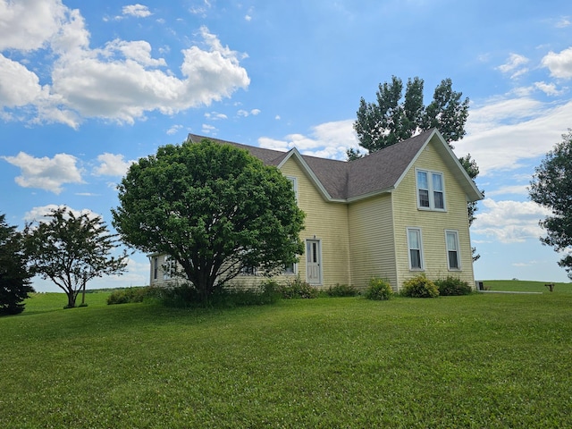 86389 245th St, Albert Lea, MN 56007 - view of home's exterior featuring a lawn