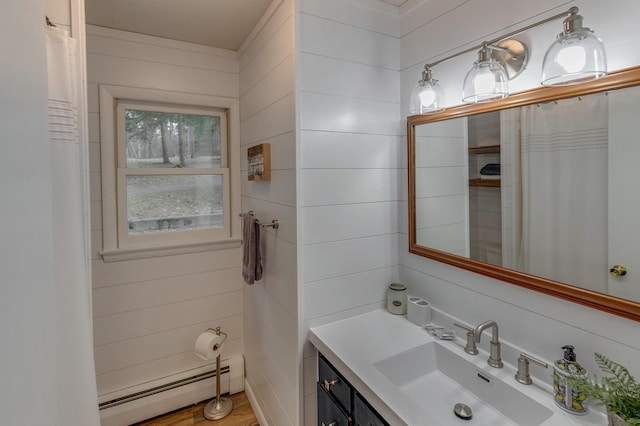 36722 Birch Dr, Jenkins Twp, MN 56474 - full bathroom featuring a baseboard heating unit, vanity, and a shower with curtain