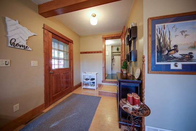 37437 State Highway 7, Big Stone Twp, MN 56278 - entryway featuring light wood-style floors and beamed ceiling