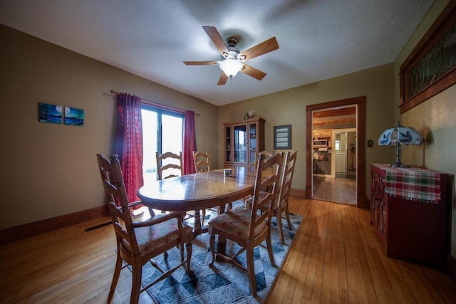 37437 State Highway 7, Big Stone Twp, MN 56278 - dining room with a ceiling fan and light wood finished floors