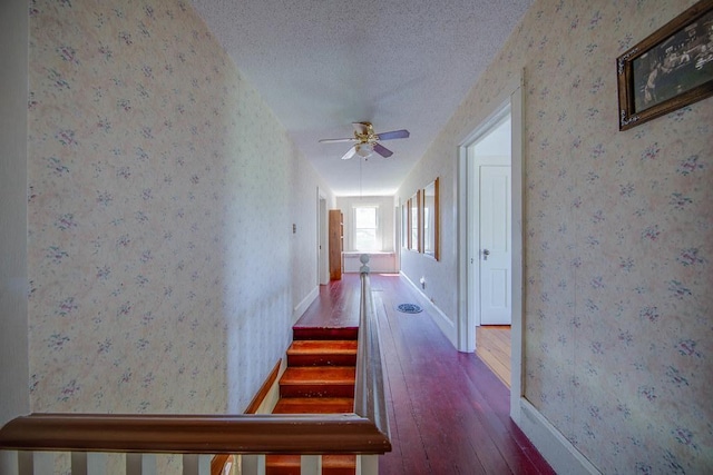 37437 State Highway 7, Big Stone Twp, MN 56278 - hall featuring hardwood / wood-style flooring, a textured ceiling, and wallpapered walls