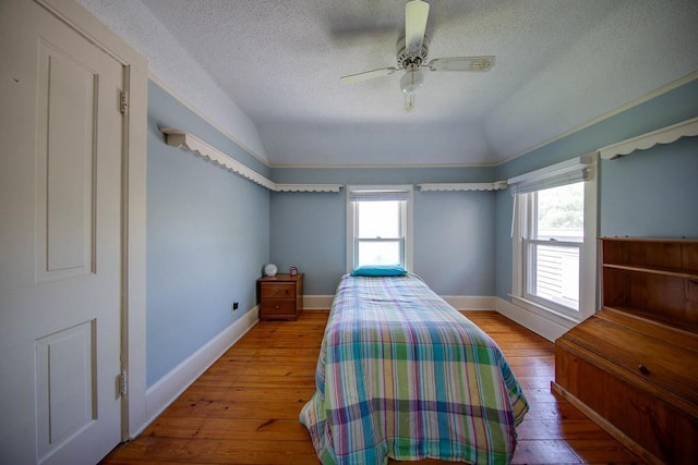 37437 State Highway 7, Big Stone Twp, MN 56278 - bedroom with a textured ceiling, hardwood / wood-style floors, and ceiling fan