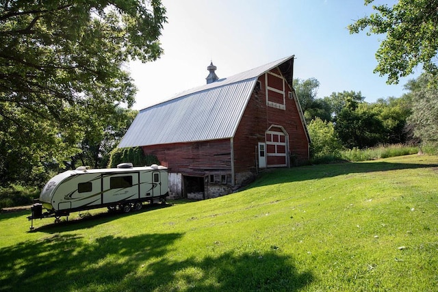 37437 State Highway 7, Big Stone Twp, MN 56278 - view of home's exterior featuring a barn, an outbuilding, and a yard