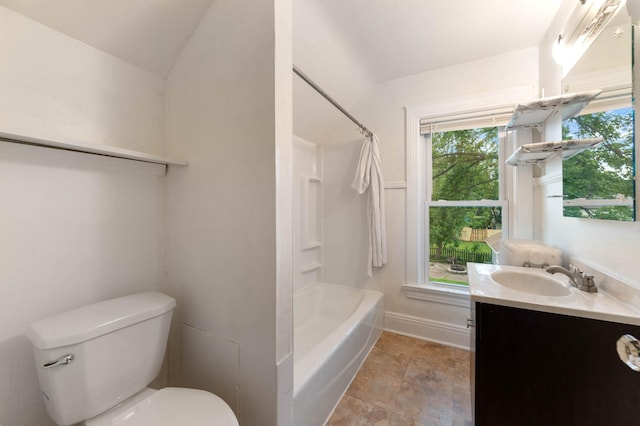 211 Saint Marie St, Duluth, MN 55803 - bathroom featuring vanity, tub / shower combination, and stone finish flooring