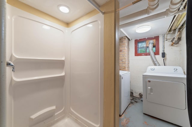 211 Saint Marie St, Duluth, MN 55803 - washroom with washer and dryer and concrete block wall