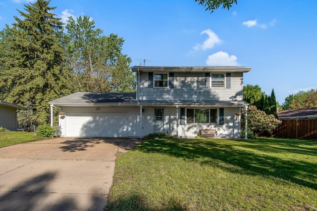 3237 Jerry Ct, White Bear Lake, MN 55110 - traditional home featuring a garage, driveway, and board and batten siding