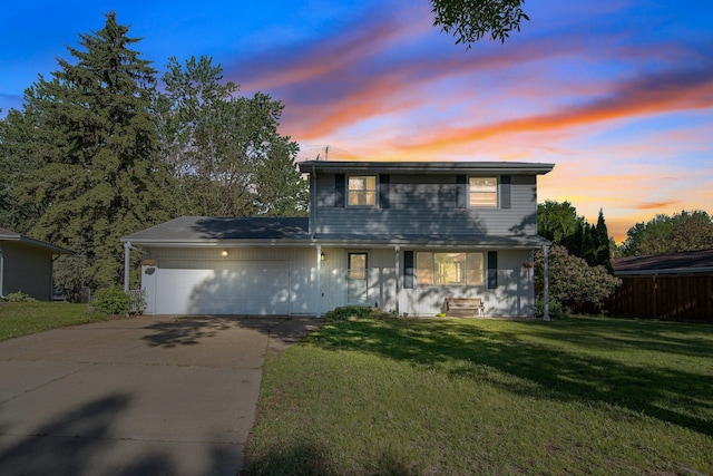 3237 Jerry Ct, White Bear Lake, MN 55110 - traditional home featuring concrete driveway, an attached garage, and a yard