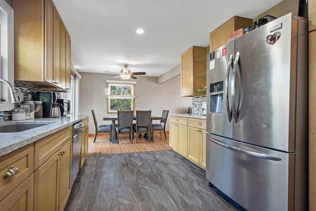 3237 Jerry Ct, White Bear Lake, MN 55110 - kitchen with appliances with stainless steel finishes, tasteful backsplash, ceiling fan, light stone countertops, and recessed lighting