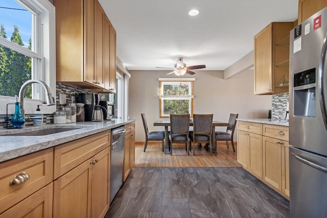 3237 Jerry Ct, White Bear Lake, MN 55110 - kitchen with appliances with stainless steel finishes, backsplash, a ceiling fan, light stone countertops, and recessed lighting
