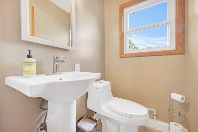 3237 Jerry Ct, White Bear Lake, MN 55110 - bathroom with toilet and baseboards