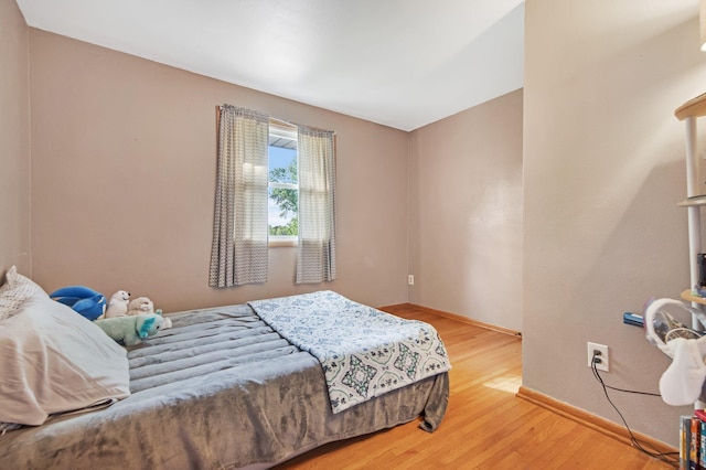 3237 Jerry Ct, White Bear Lake, MN 55110 - bedroom with wood finished floors and baseboards
