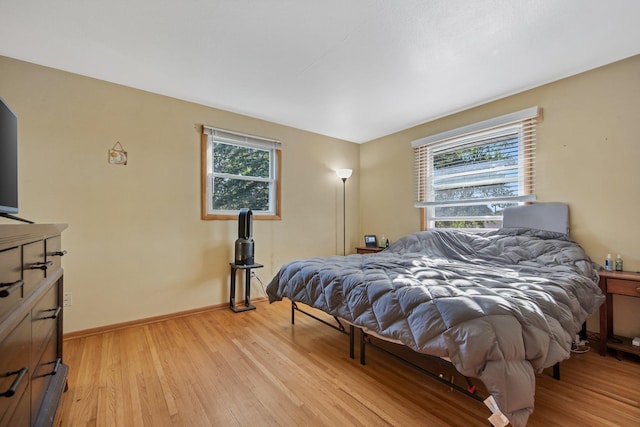 3237 Jerry Ct, White Bear Lake, MN 55110 - bedroom with light wood finished floors and baseboards