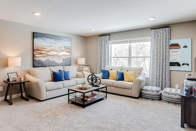 23632 Ashbury Dr, Rogers, MN 55374 - carpeted living area featuring a textured ceiling and recessed lighting