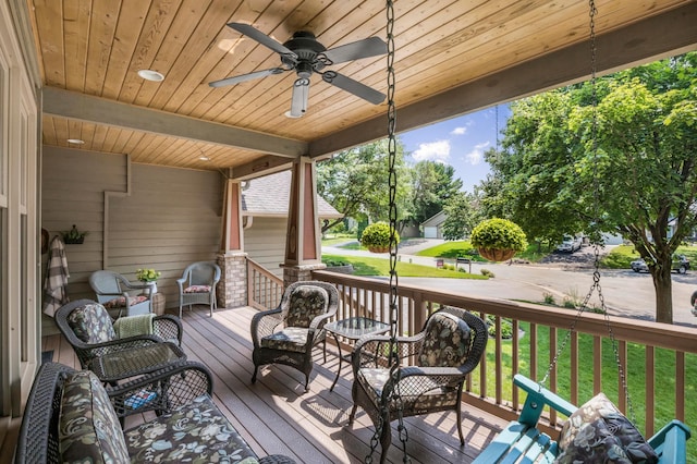 12145 Jonquil St NW, Coon Rapids, MN 55433 - wooden deck featuring ceiling fan, outdoor lounge area, and a yard