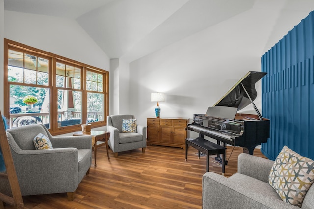 12145 Jonquil St NW, Coon Rapids, MN 55433 - sitting room featuring wood finished floors and lofted ceiling