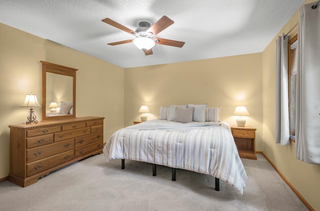 12145 Jonquil St NW, Coon Rapids, MN 55433 - bedroom featuring light carpet and ceiling fan
