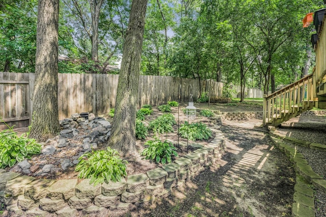 12145 Jonquil St NW, Coon Rapids, MN 55433 - fenced backyard featuring stairway