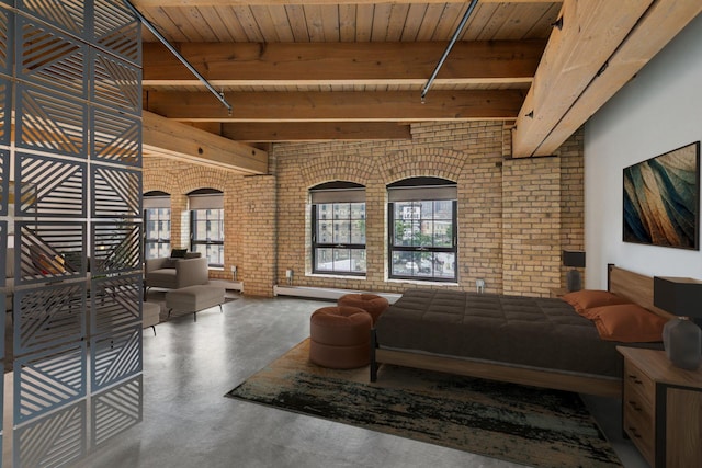 404 Washington Ave N Unit 304, Minneapolis, MN 55401 - bedroom with brick wall, finished concrete flooring, multiple windows, and a wood ceiling with exposed beams