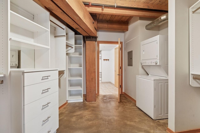 404 Washington Ave N Unit 304, Minneapolis, MN 55401 - walk in closet featuring stacked washing machine and dryer, electric panel, and beamed ceiling
