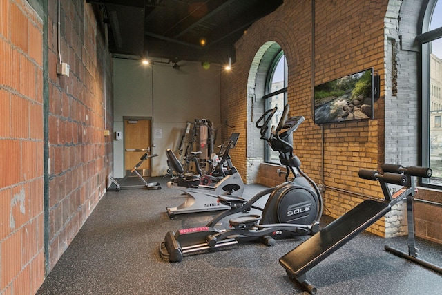 404 Washington Ave N Unit 304, Minneapolis, MN 55401 - gym with a high ceiling and brick wall