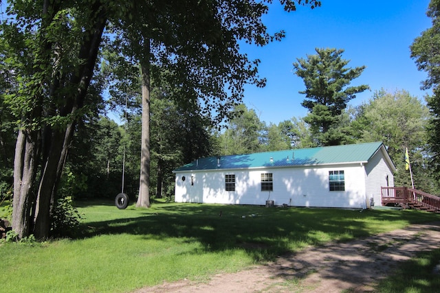 23829 Bulrush Dr, Lake Edward Twp, MN 56465 - ranch-style house with a front lawn and a metal roof