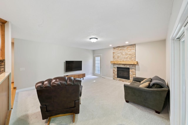 1110 Lecuyer Dr, Stillwater, MN 55082 - carpeted living room with a stone fireplace and recessed lighting