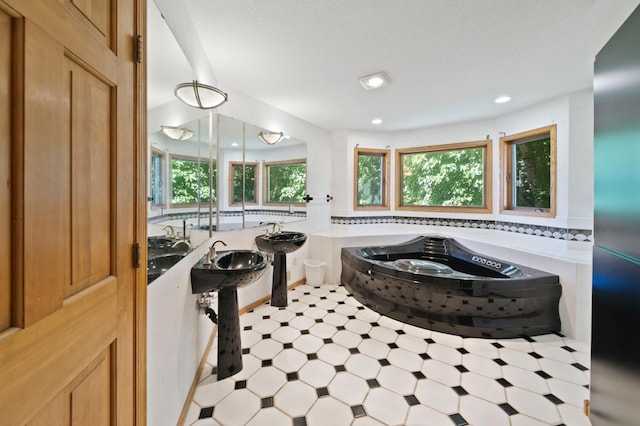 1110 Lecuyer Dr, Stillwater, MN 55082 - full bath with tile patterned floors, a bath, and recessed lighting