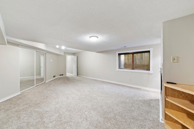 1110 Lecuyer Dr, Stillwater, MN 55082 - finished basement with carpet floors and a textured ceiling