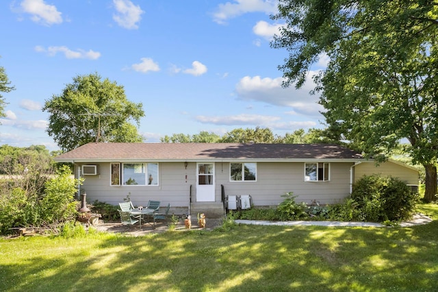674 Greer Ave NW, Maple Lake, MN 55358 - ranch-style house featuring entry steps, a front yard, a patio, and a wall unit AC