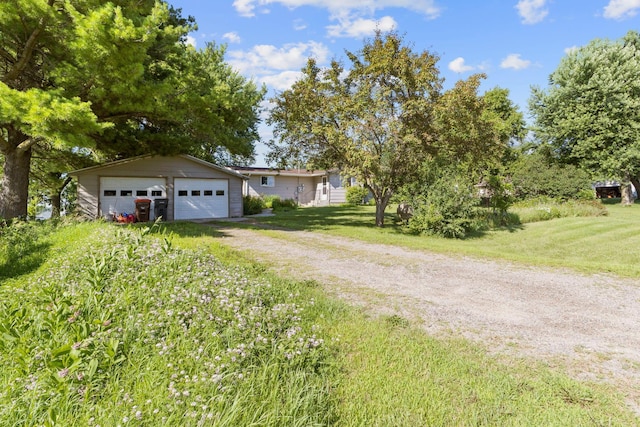 674 Greer Ave NW, Maple Lake, MN 55358 - view of front facade with a garage and a front yard