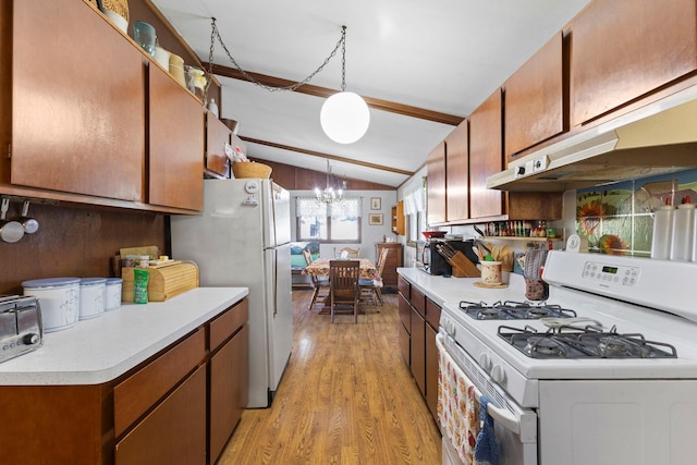 674 Greer Ave NW, Maple Lake, MN 55358 - kitchen featuring white appliances, light wood-style floors, light countertops, and a chandelier