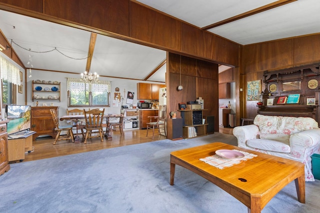 674 Greer Ave NW, Maple Lake, MN 55358 - living room featuring carpet floors, a chandelier, wooden walls, and lofted ceiling