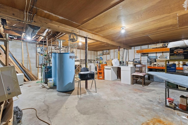 674 Greer Ave NW, Maple Lake, MN 55358 - unfinished basement with water heater, washer and dryer, and a workshop area
