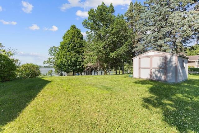 674 Greer Ave NW, Maple Lake, MN 55358 - view of green lawn with a storage unit