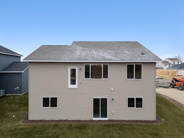 17006 Traprock St NW, Ramsey, MN 55303 - back of property featuring a yard and roof with shingles