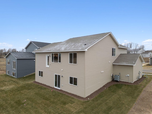 17006 Traprock St NW, Ramsey, MN 55303 - rear view of house with a lawn and a shingled roof