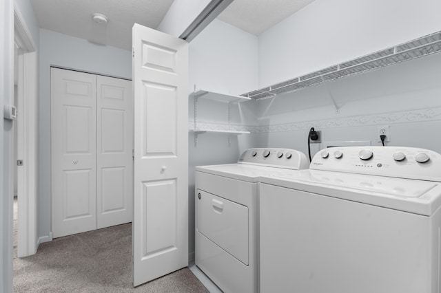 3204 49th St NW, Rochester, MN 55901 - washroom featuring washing machine and dryer and light carpet