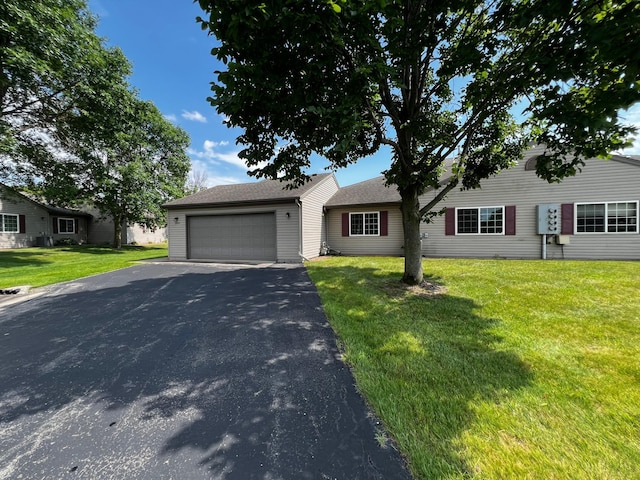 3204 49th St NW, Rochester, MN 55901 - view of front of property with driveway, a front yard, and an attached garage